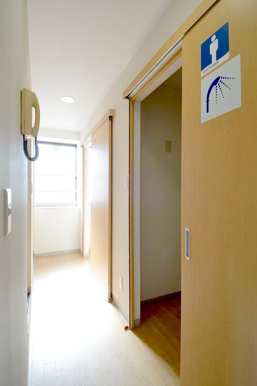 Tweepersoonskamer in Japanse Stijl met 2 Aparte Bedden en Gedeelde Badkamer