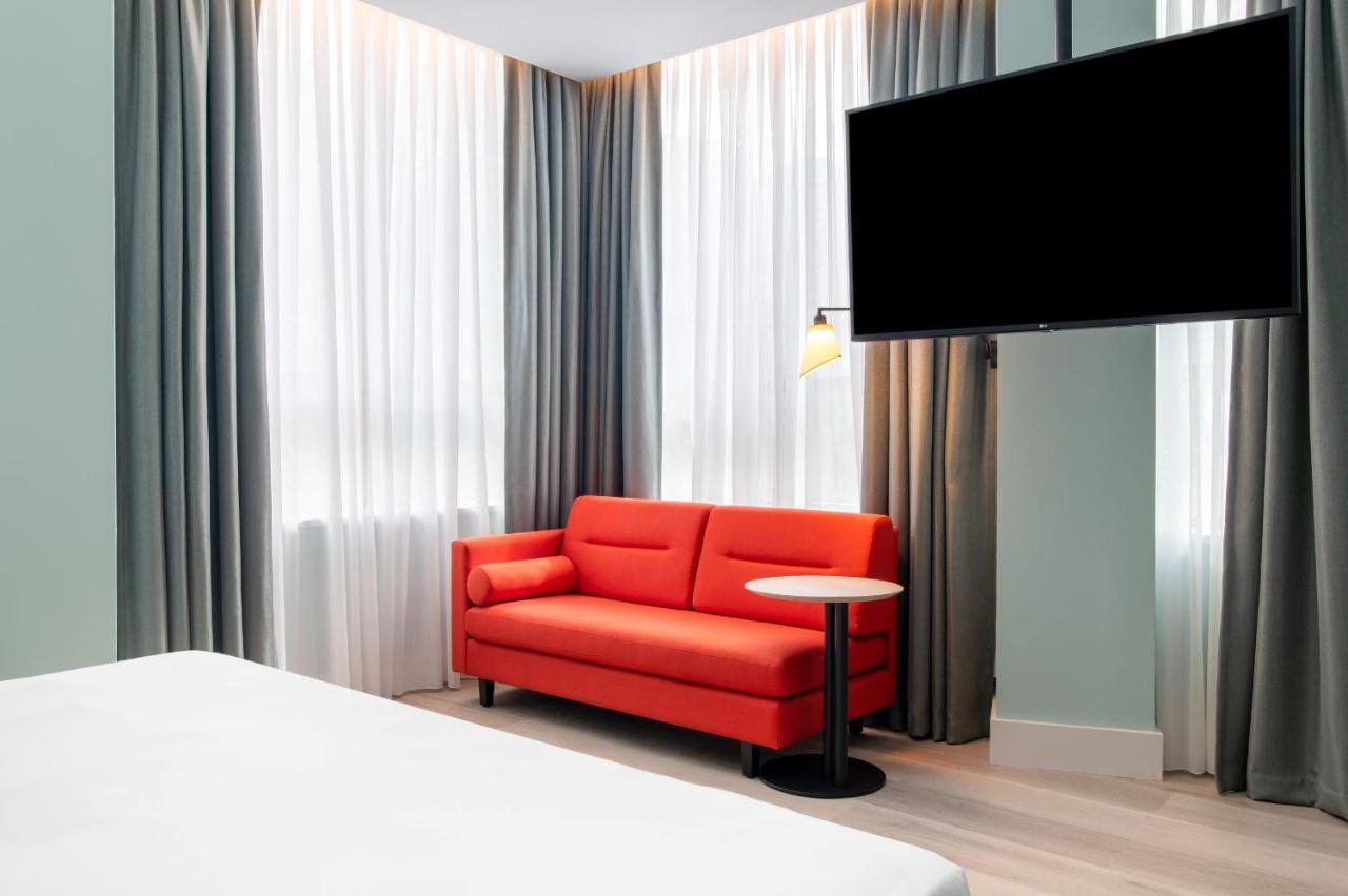 Quarto King com Sofá-cama