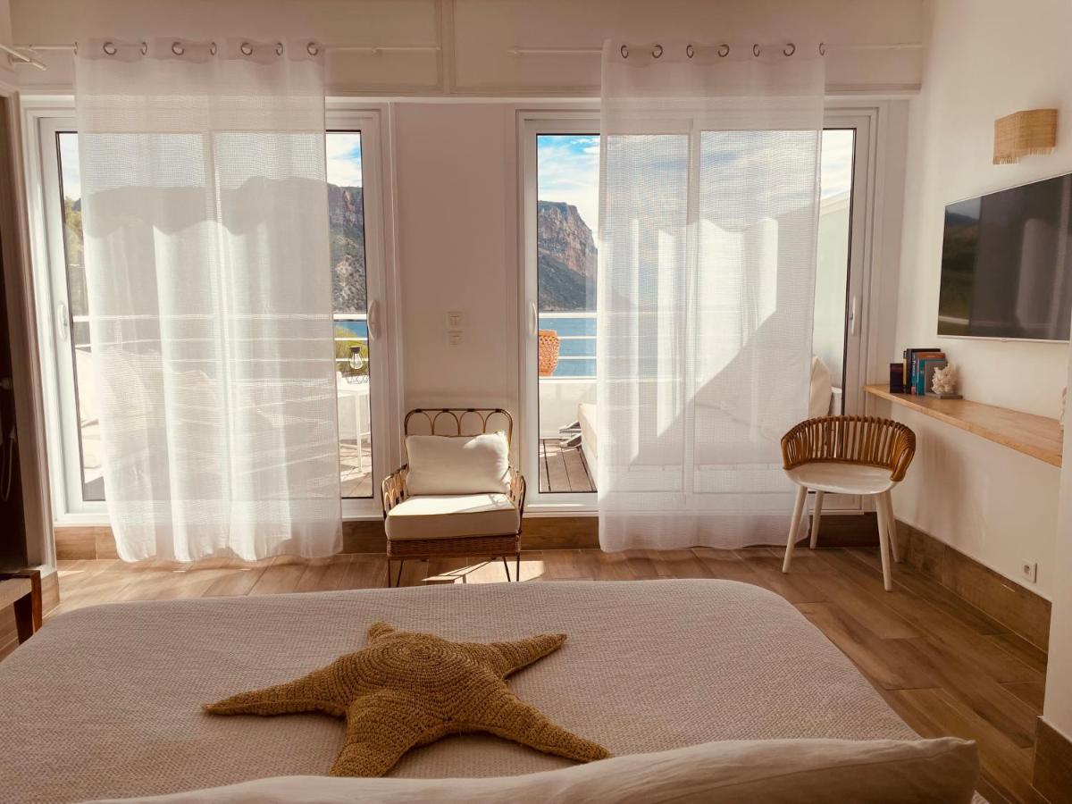Suite met uitzicht op de zee en het terras