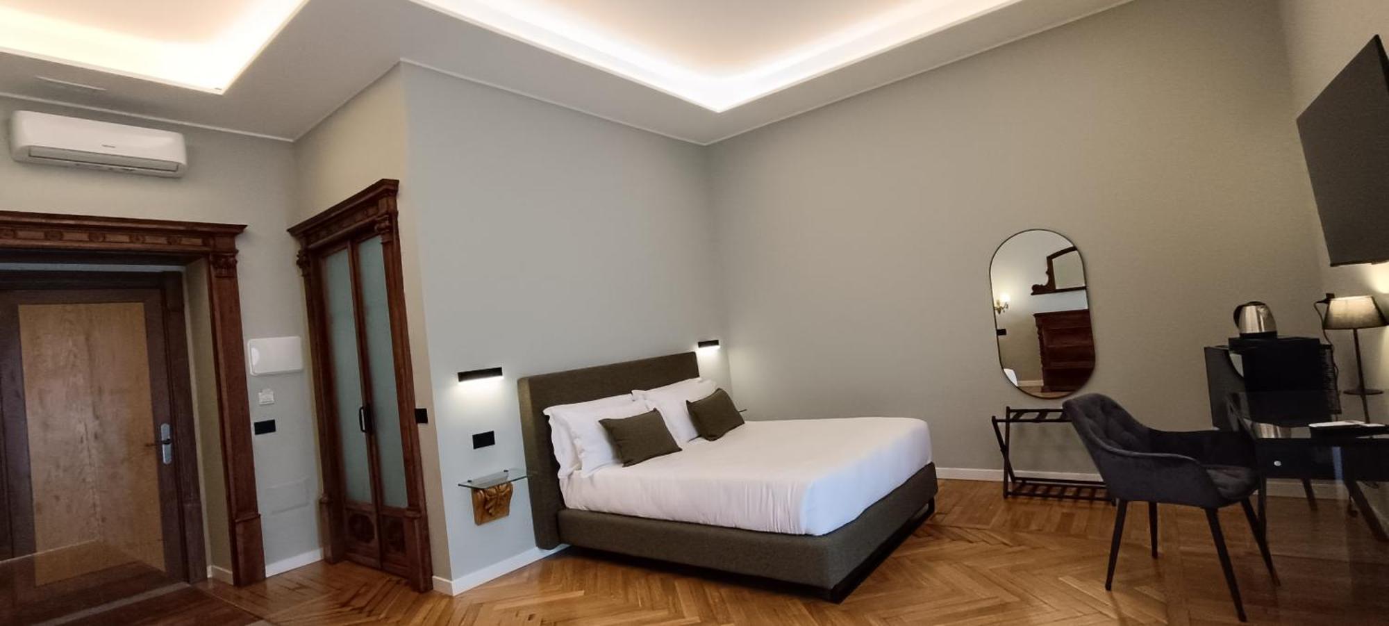 Habitación Cuádruple Deluxe con balcón