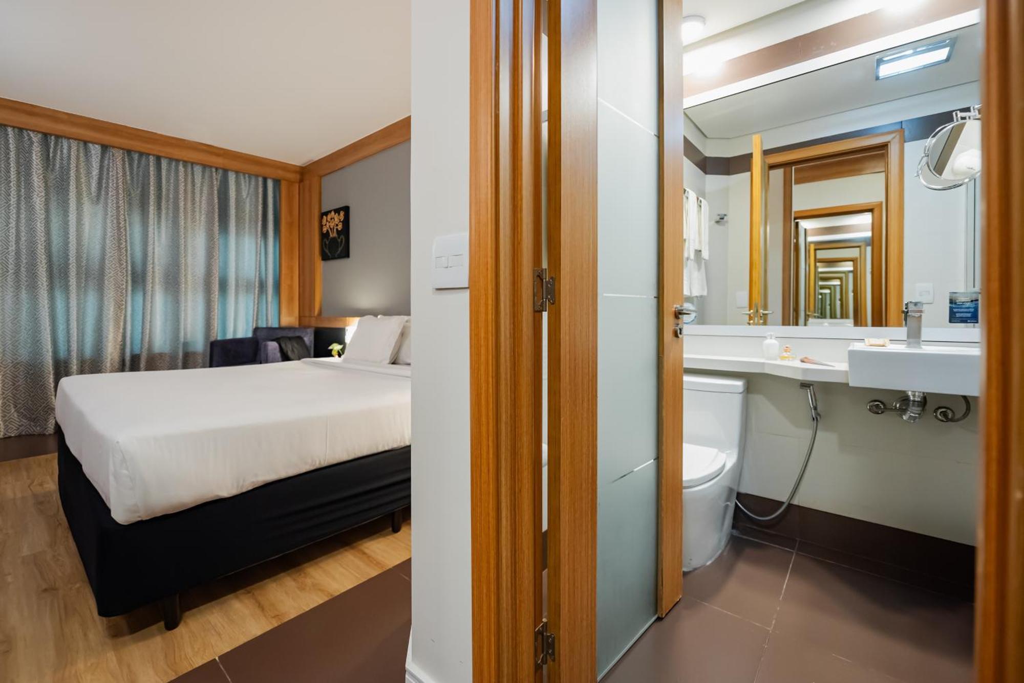 Quarto duplo premium com cama king-size