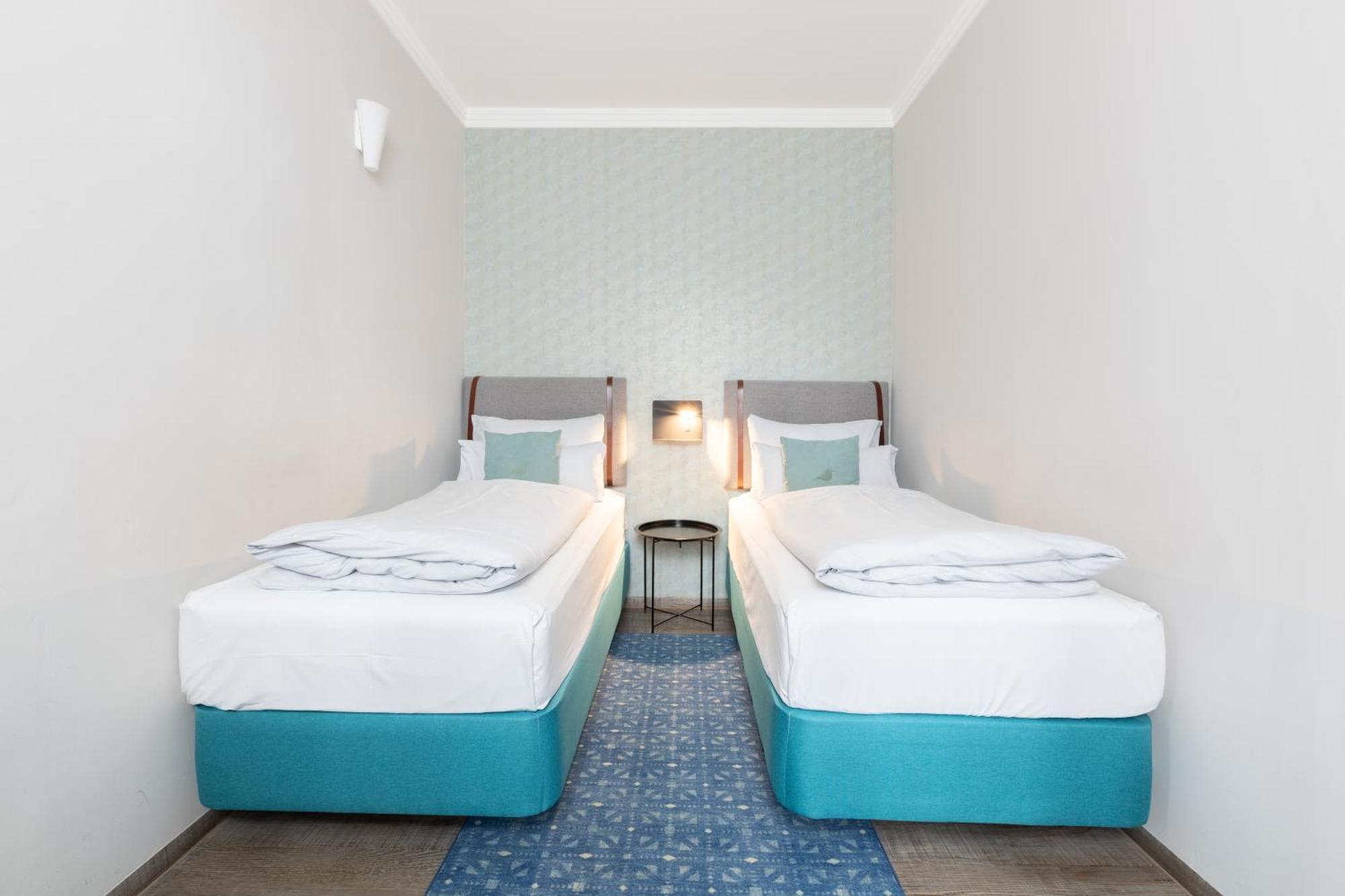 Standaard Familiekamer met 2 Queensize Bedden