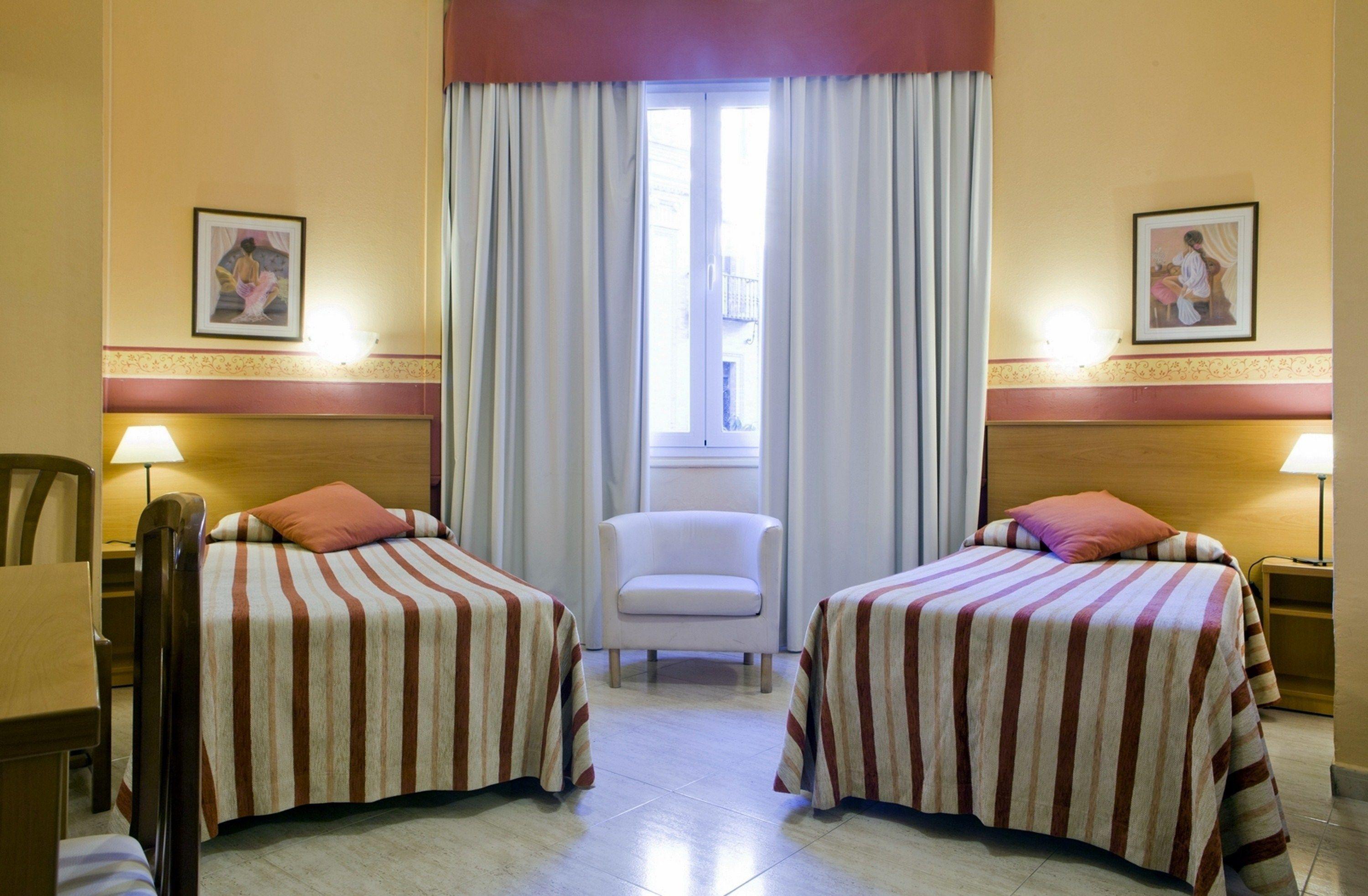 2 Aparte Bedden en Extra Bed
