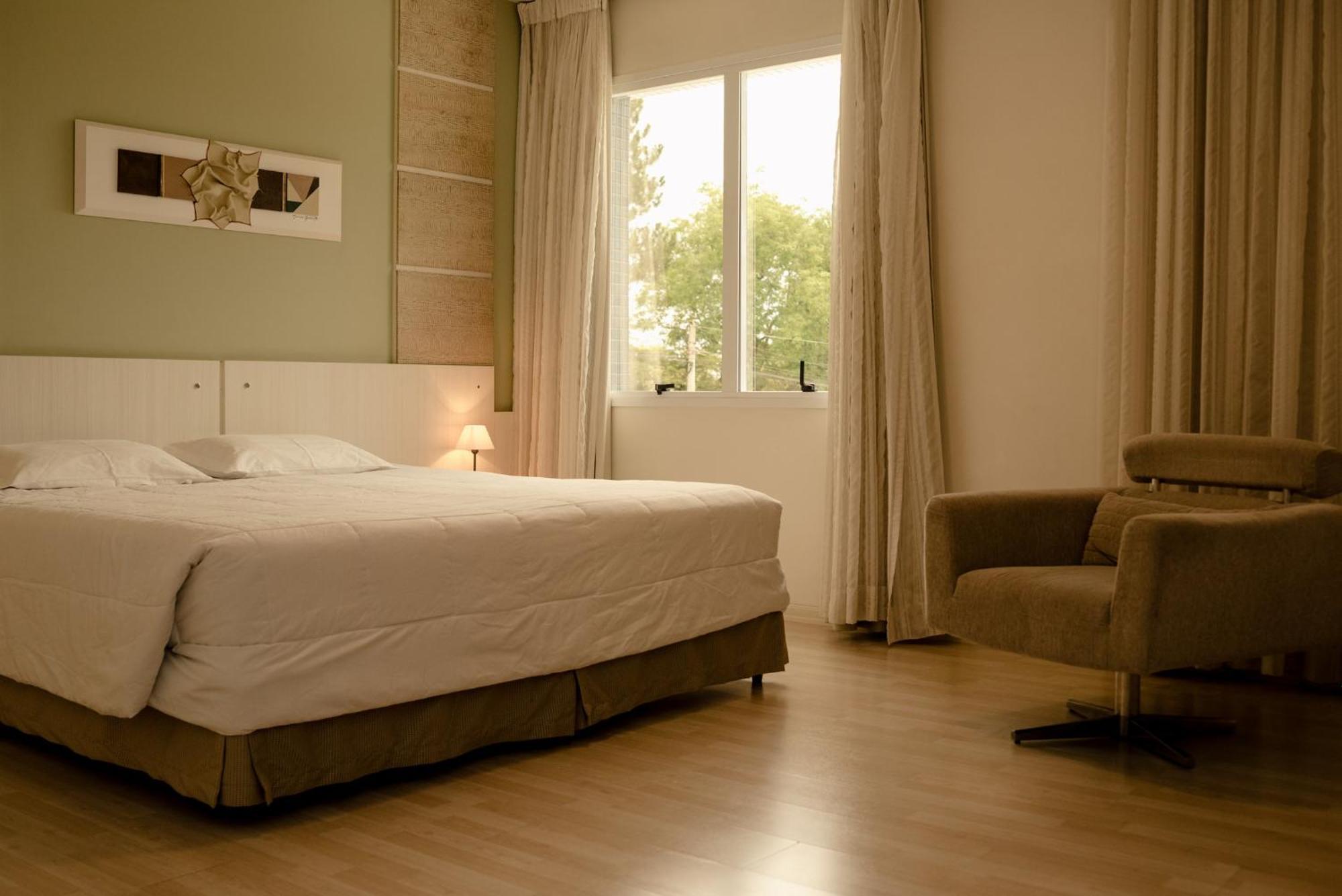 Quarto Luxo com Cama de Casal ou 2 de Solteiro