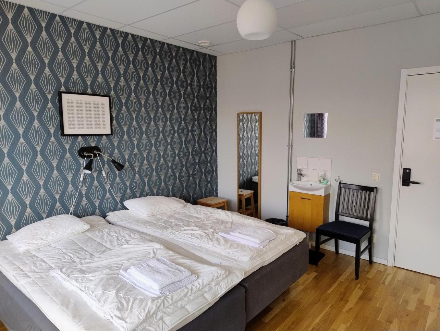 Zweibettzimmer mit Gemeinschaftsbad