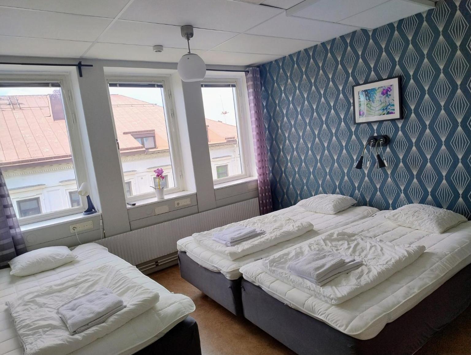 Dreibettzimmer mit Gemeinschaftsbad