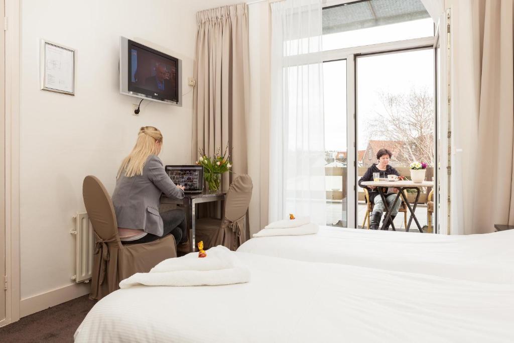Tweepersoonskamer met 2 Aparte Bedden en Balkon